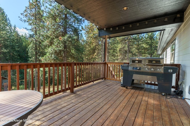 wooden terrace with grilling area