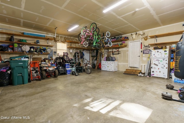 garage featuring a workshop area