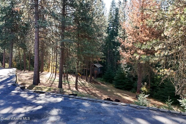 view of street featuring a view of trees