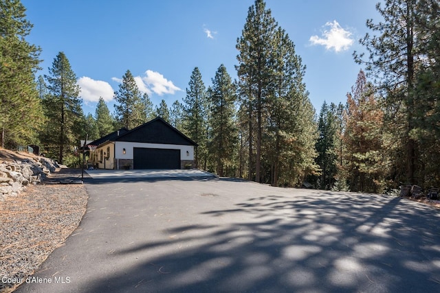 exterior space featuring an attached garage and driveway