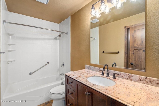 full bath featuring shower / washtub combination, visible vents, a textured wall, toilet, and vanity