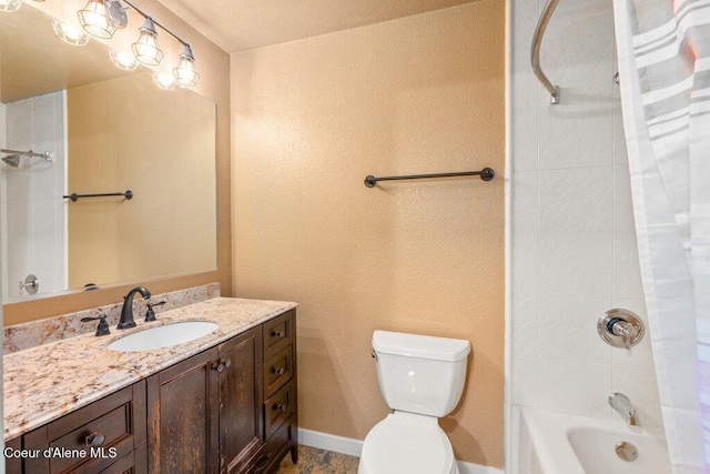 bathroom featuring shower / tub combo, baseboards, vanity, and toilet