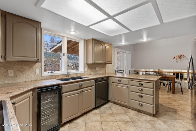 kitchen featuring wine cooler, backsplash, a sink, dishwasher, and a peninsula