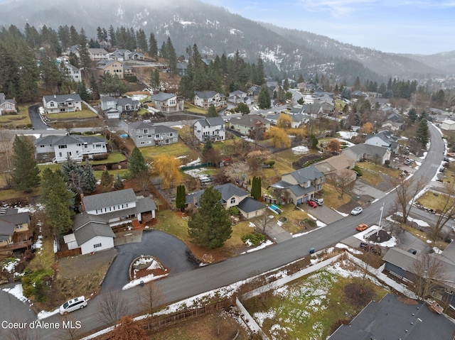 drone / aerial view with a residential view and a mountain view