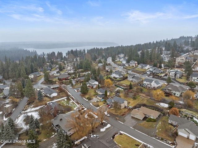 birds eye view of property with a residential view