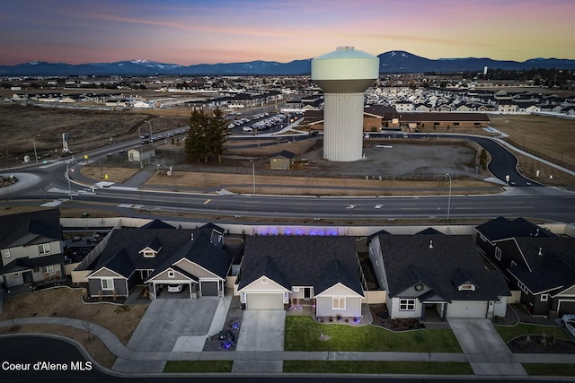 birds eye view of property featuring a mountain view