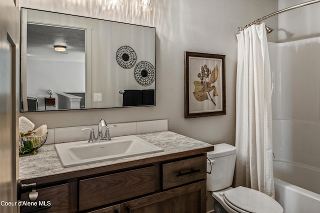 full bath featuring vanity, toilet, and shower / bath combo with shower curtain