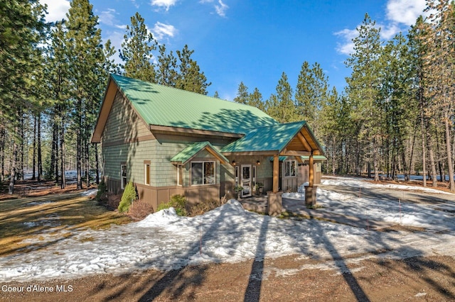 view of front of home featuring metal roof