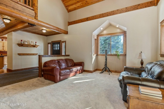 carpeted living area with high vaulted ceiling, wooden ceiling, and baseboards