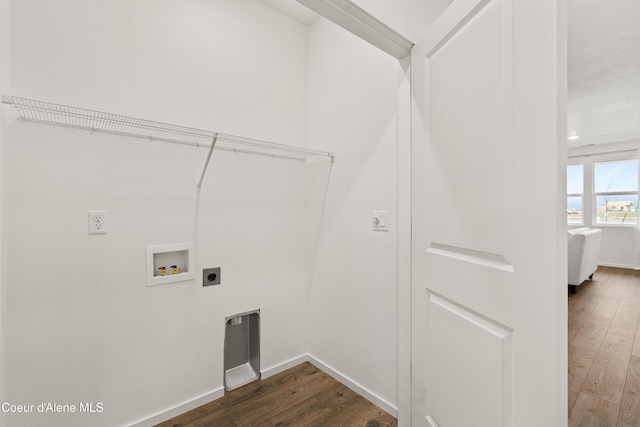 washroom with baseboards, dark wood-style flooring, electric dryer hookup, and washer hookup