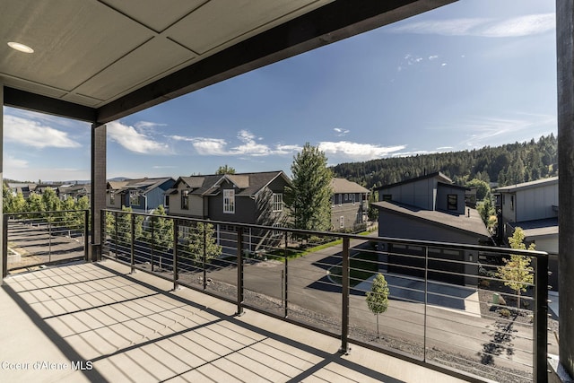 balcony featuring a residential view