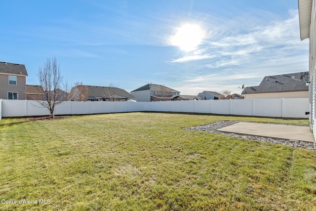 view of yard featuring a fenced backyard and a patio