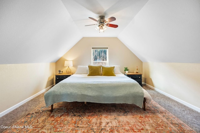 bedroom featuring ceiling fan, carpet, lofted ceiling, and baseboards