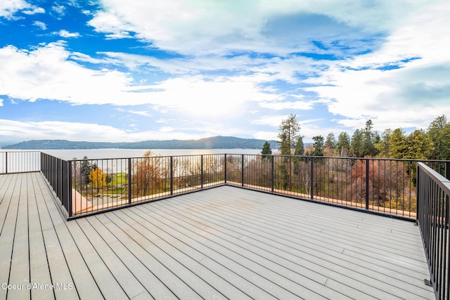 deck featuring a water view