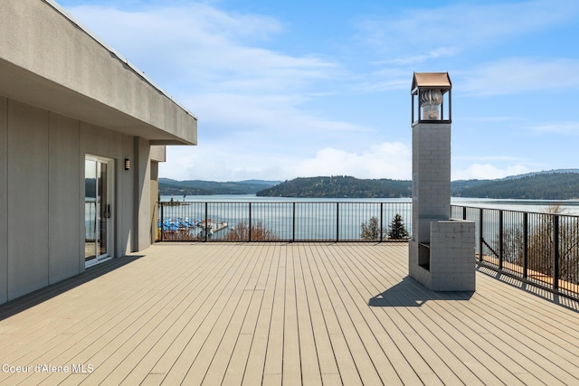 301 N 1st St # 930, Coeur Dalene, ID 83814 - wooden deck with a water view
