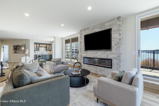 301 N 1st St # 930, Coeur Dalene, ID 83814 - living area with a fireplace, recessed lighting, and wood finished floors