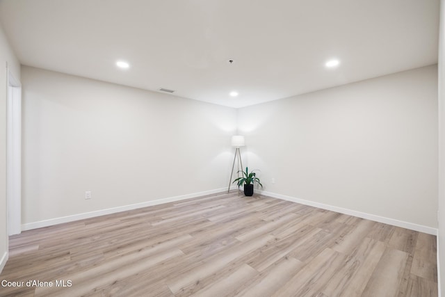 301 N 1st St # 930, Coeur Dalene, ID 83814 - spare room with recessed lighting, baseboards, light wood-type flooring, and visible vents