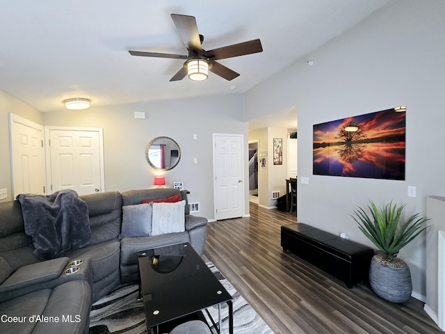 living area featuring a ceiling fan, lofted ceiling, wood finished floors, and baseboards