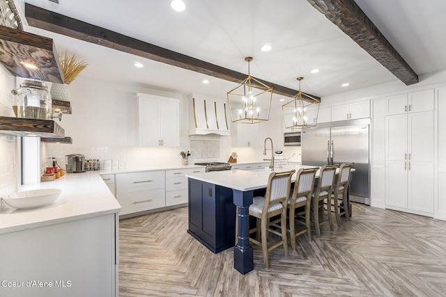 1853 W Felton Dr, Coeur Dalene, ID 83814 - kitchen with stainless steel appliances, beam ceiling, premium range hood, and tasteful backsplash
