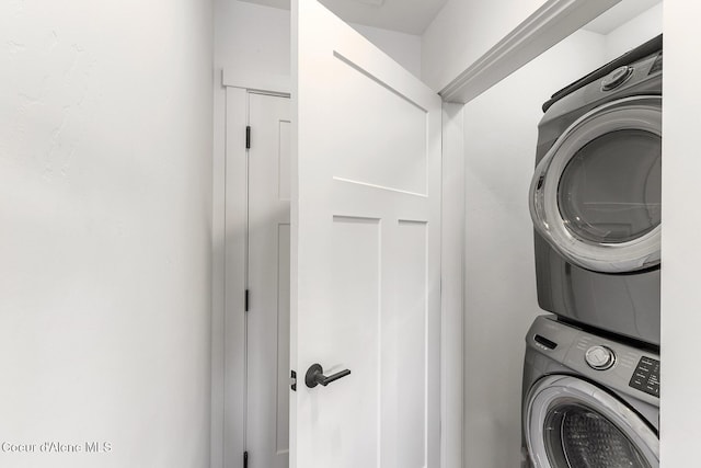 1853 W Felton Dr, Coeur Dalene, ID 83814 - clothes washing area featuring laundry area and stacked washing maching and dryer