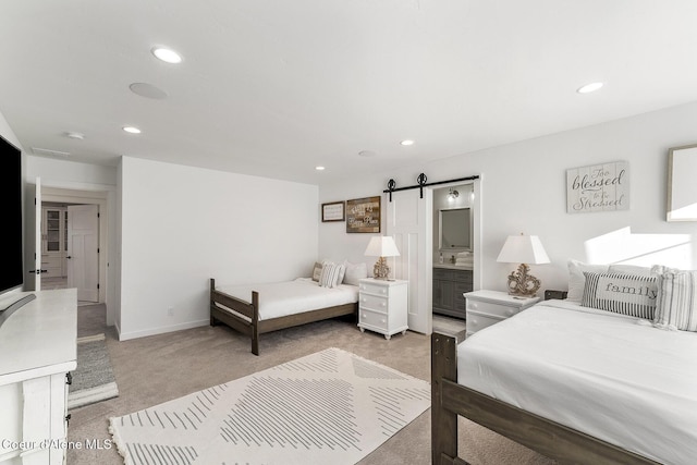 1853 W Felton Dr, Coeur Dalene, ID 83814 - bedroom with recessed lighting, light carpet, baseboards, and a barn door