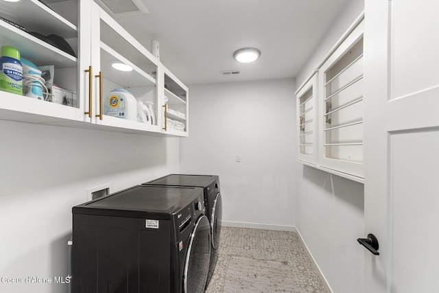 1853 W Felton Dr, Coeur Dalene, ID 83814 - washroom featuring laundry area, baseboards, visible vents, and separate washer and dryer