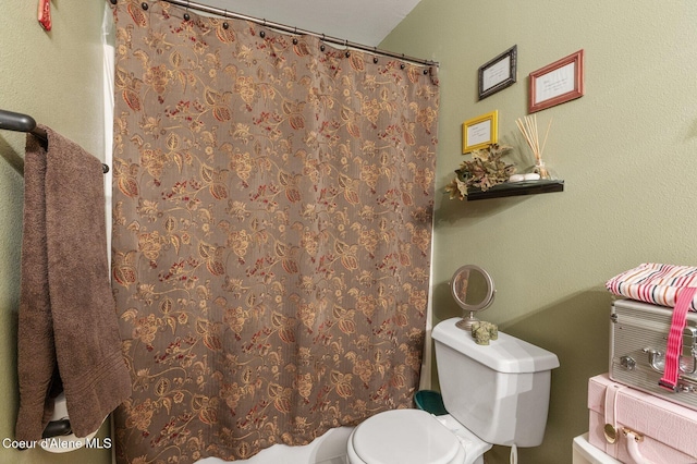 full bathroom with toilet and a shower with curtain