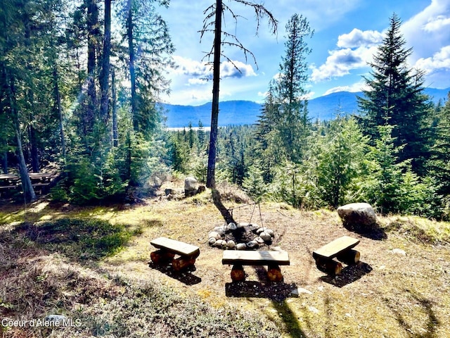 mountain view featuring a view of trees