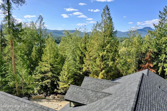 property view of mountains with a forest view