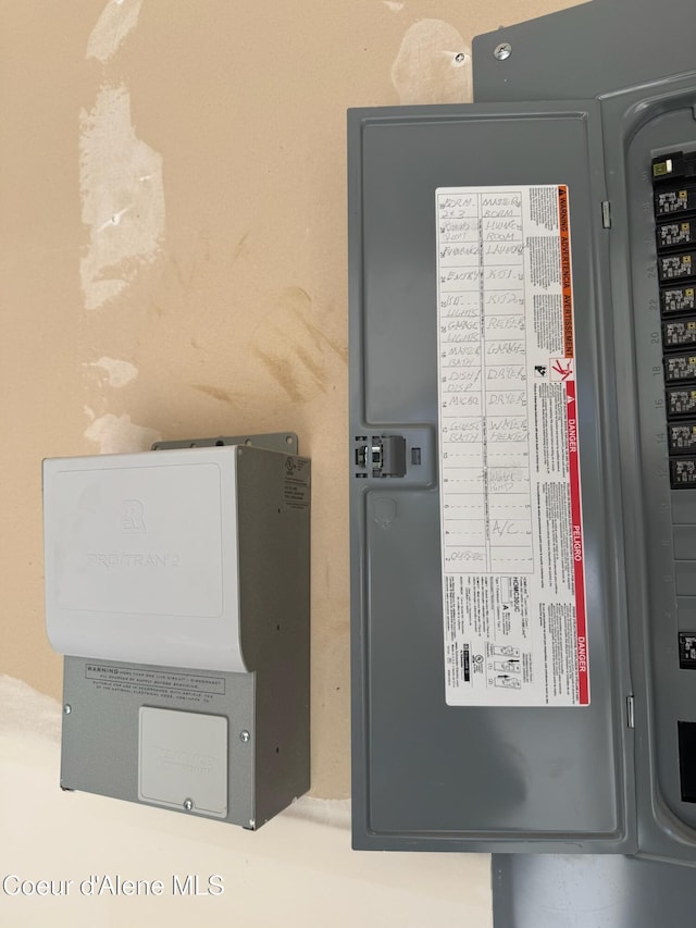 utility room featuring electric panel
