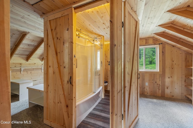 bonus room featuring lofted ceiling, wood walls, and wood ceiling