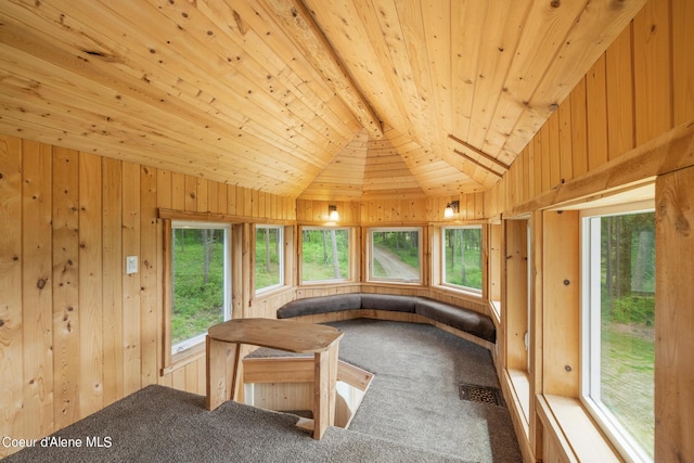 sunroom / solarium with wood ceiling, visible vents, and vaulted ceiling