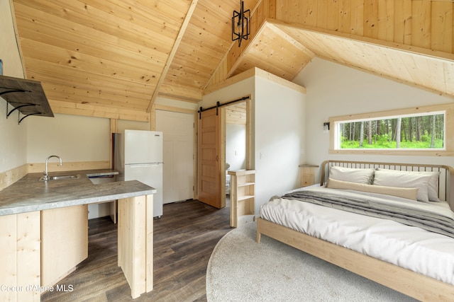 bedroom featuring a barn door, dark wood-type flooring, a sink, wood ceiling, and freestanding refrigerator