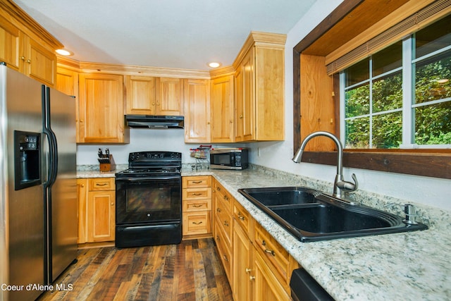 kitchen featuring black / electric stove, under cabinet range hood, a sink, fridge with ice dispenser, and stainless steel microwave