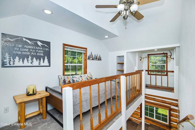 interior space with vaulted ceiling, carpet flooring, and recessed lighting