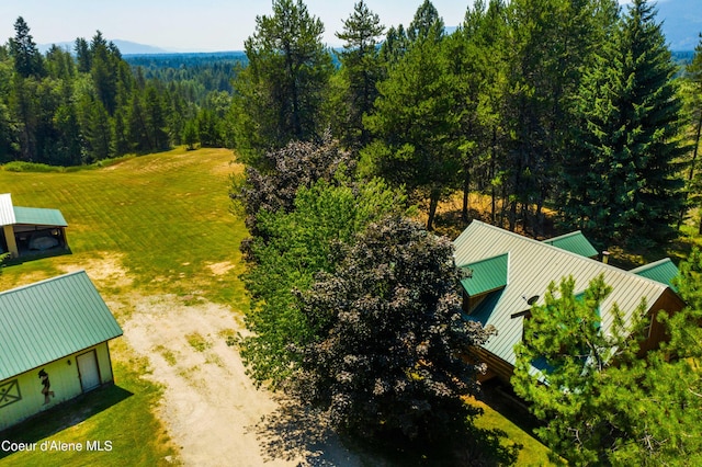 aerial view featuring a view of trees