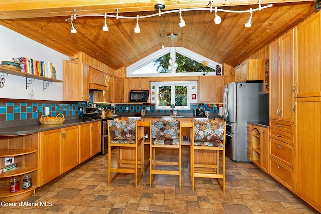 kitchen featuring open shelves, appliances with stainless steel finishes, dark countertops, and backsplash