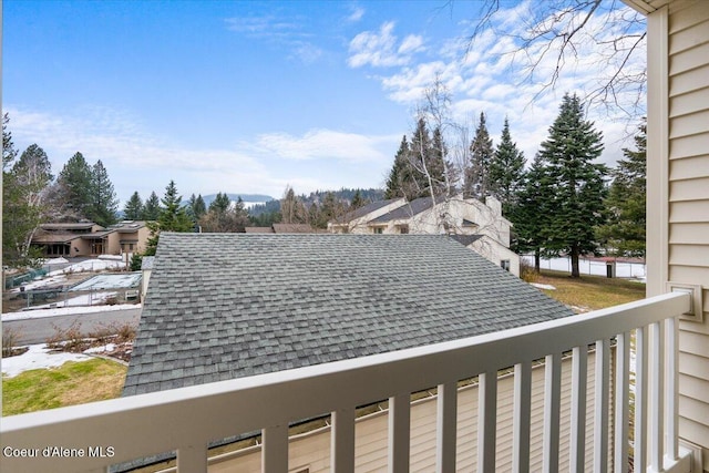 exterior details featuring a shingled roof