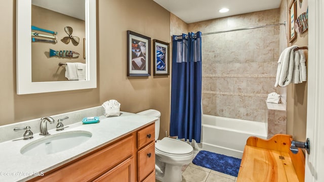 bathroom with toilet, shower / bath combo, vanity, and tile patterned floors