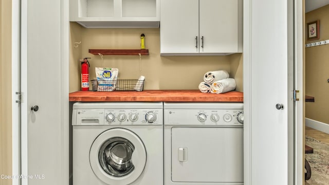 laundry room featuring separate washer and dryer