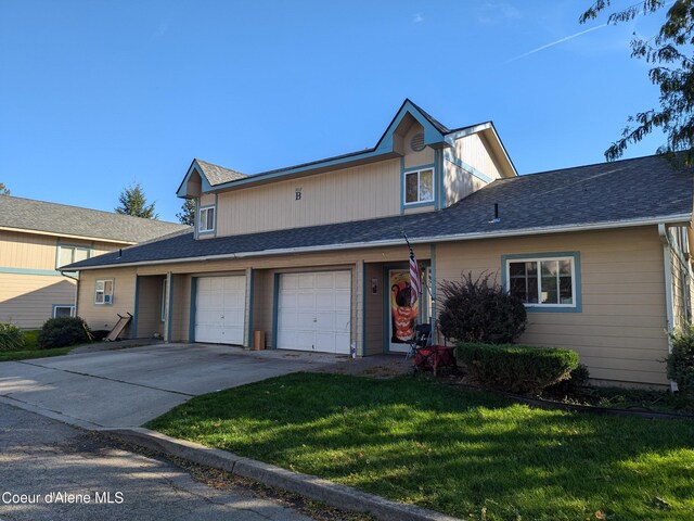 1810 Spokane St 1800, 1802, 1804, 1806, 1808, Post Falls, ID 83854 - view of front facade with a garage, concrete driveway, roof with shingles, and a front yard