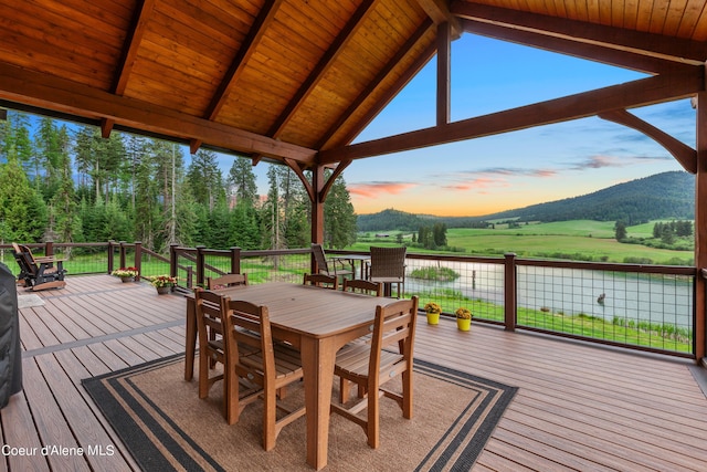 deck featuring outdoor dining area