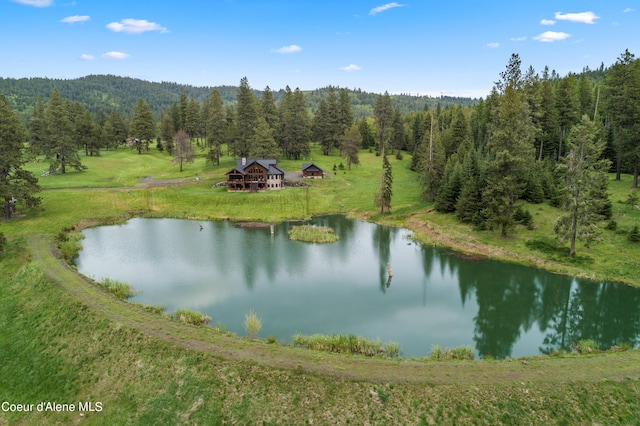 property view of water featuring a view of trees