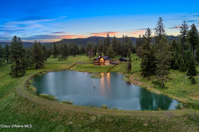 property view of water featuring a view of trees