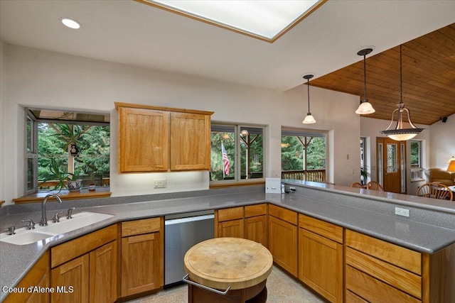 kitchen with recessed lighting, a peninsula, a sink, stainless steel dishwasher, and pendant lighting