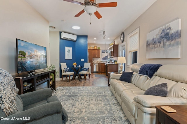 living area featuring dark wood finished floors, ceiling fan, baseboards, and a wall mounted AC