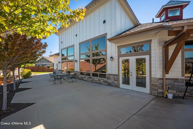 view of patio with fence and french doors