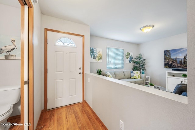 foyer with light wood-style floors