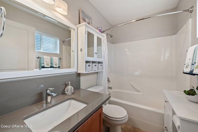 bathroom with toilet, shower / washtub combination, and vanity