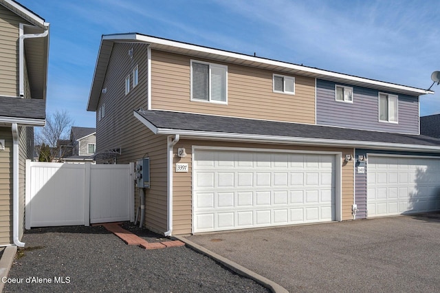 view of front of property featuring fence